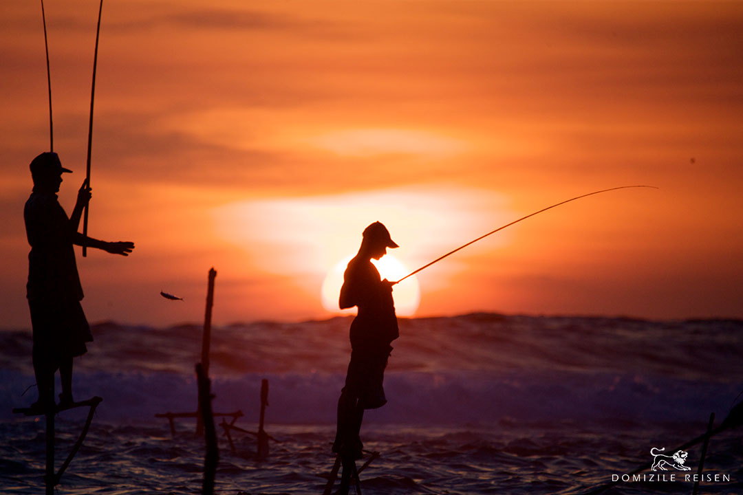 fischermen at sunset